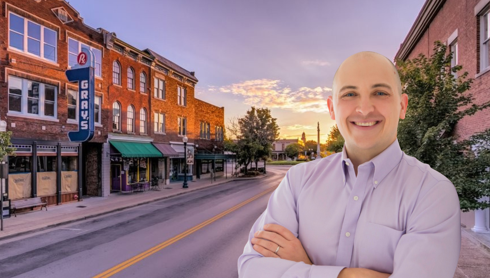 Tommy Jaggers smiling on Main Street in downtown Franklin, Tennessee at sunset