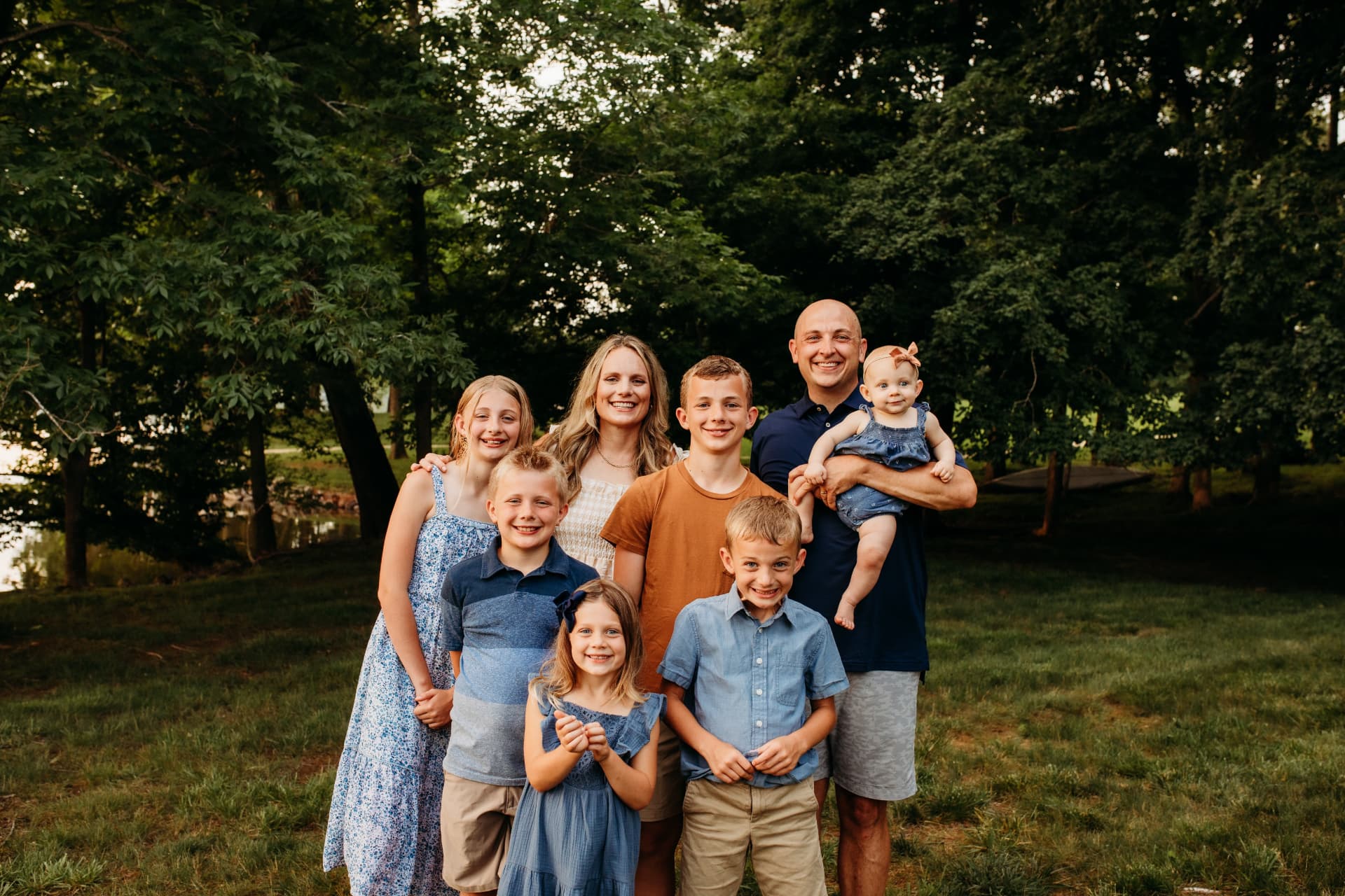 Tommy Jaggers with his family outdoors.
